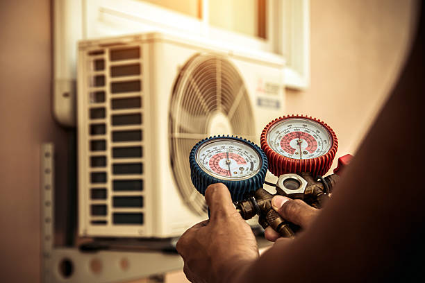 Professional Ac Installation technician working in Cumming, GA